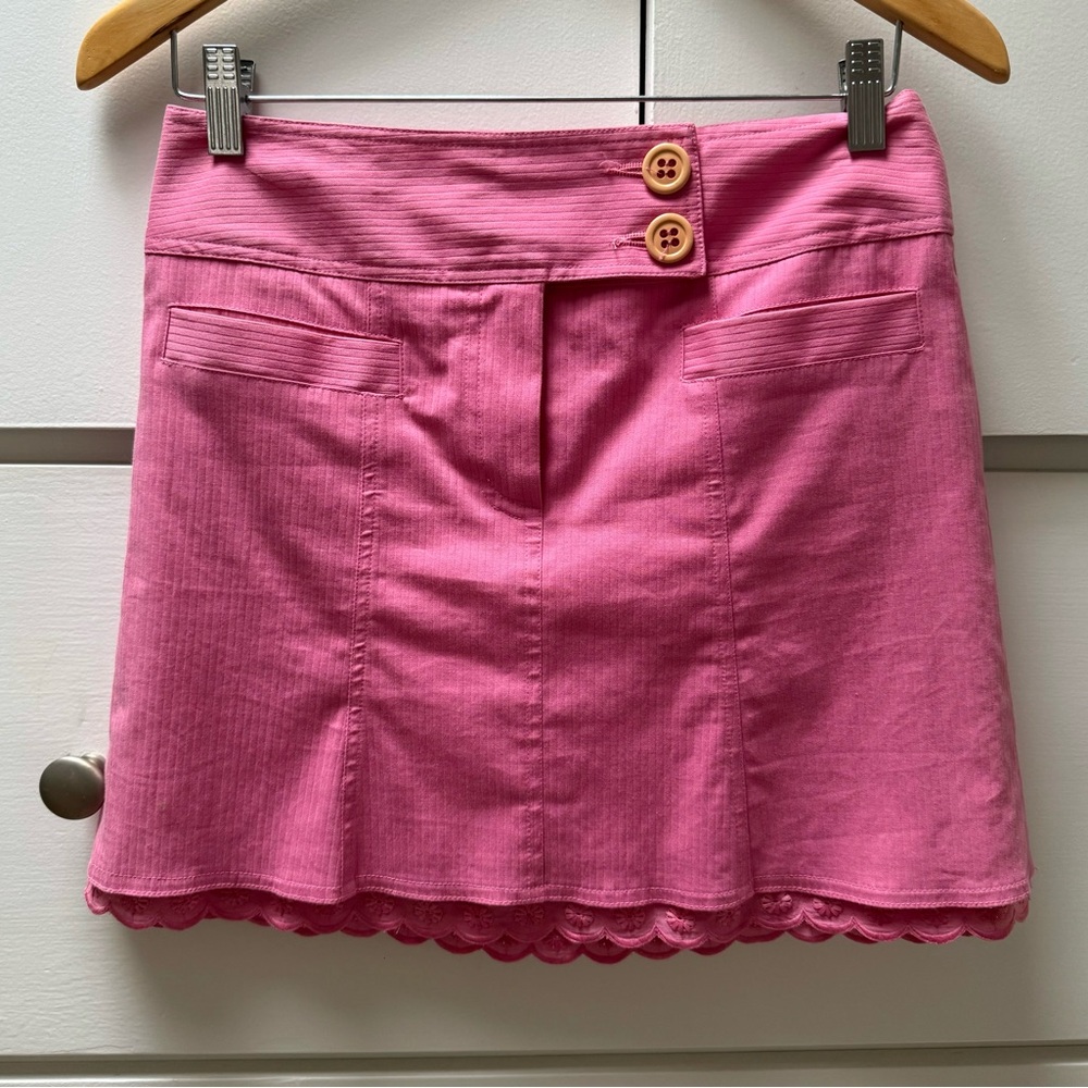 Adorable hot pink mini skirt.